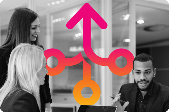 Group of professionals around a computer talking