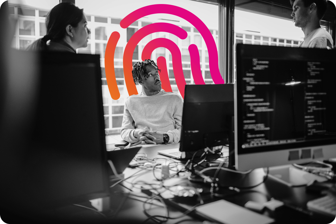 soc analysts gathered around monitors